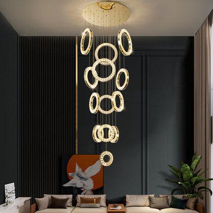 Luster Gaze Aura Grandeur Multi-Ring Round Chandelier - American transitional great room with cathedral ceiling